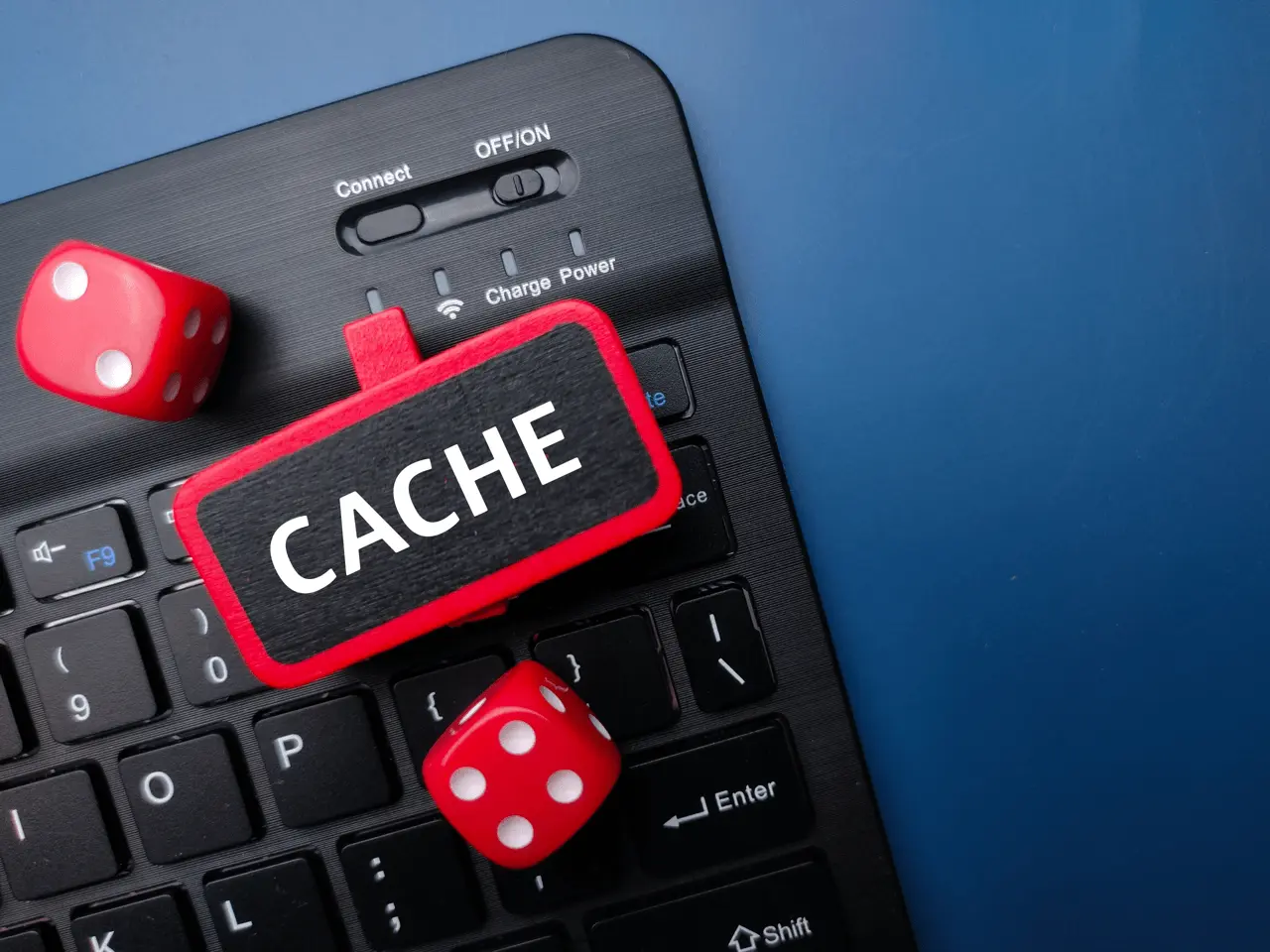 keyboard and red dice with the word cache busines 2023 03 11 04 57 01 utc Large 1